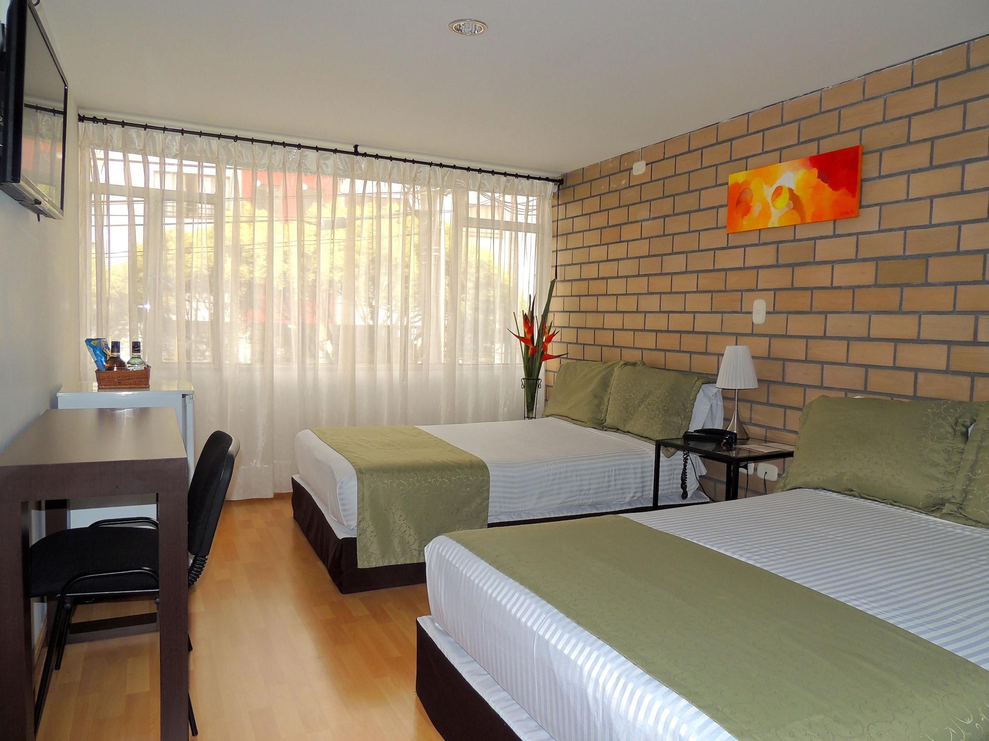 Hotel Portal De Milan Manizales Bagian luar foto